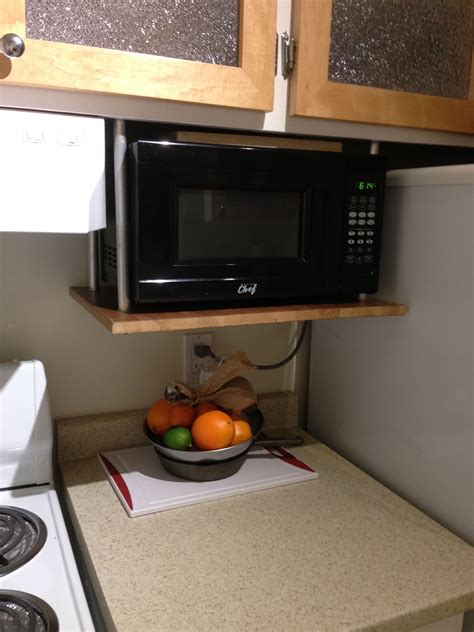 bracket placement for wall mounted under cabinet microwave|small hanging microwave under cabinet.